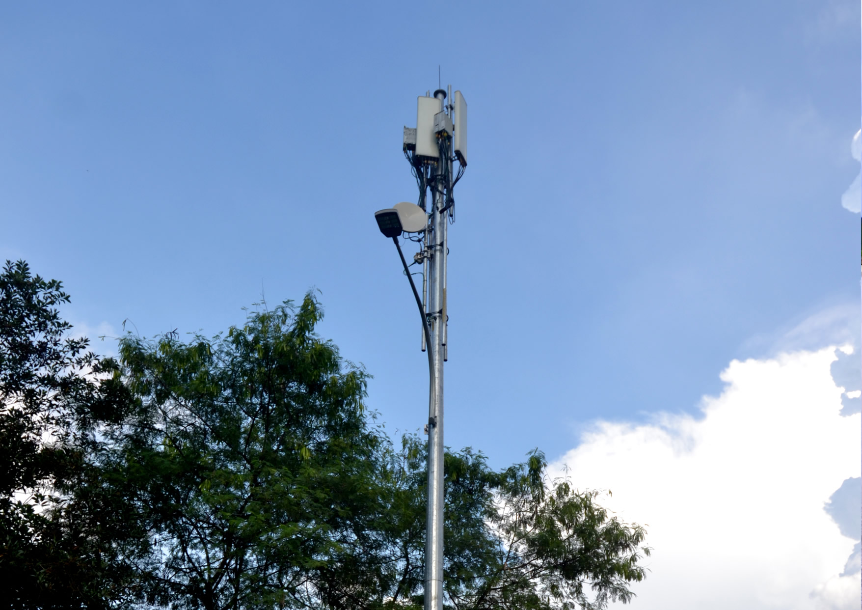 Replacement of street light poles with integrated poles within ROW